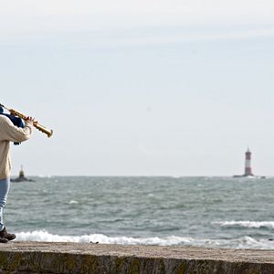 Photo Souffler plus fort que la mer