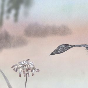Photo Un oiseau qui aime une fleur
