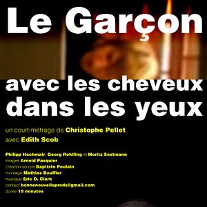 Photo Le Garçon avec les cheveux dans les yeux