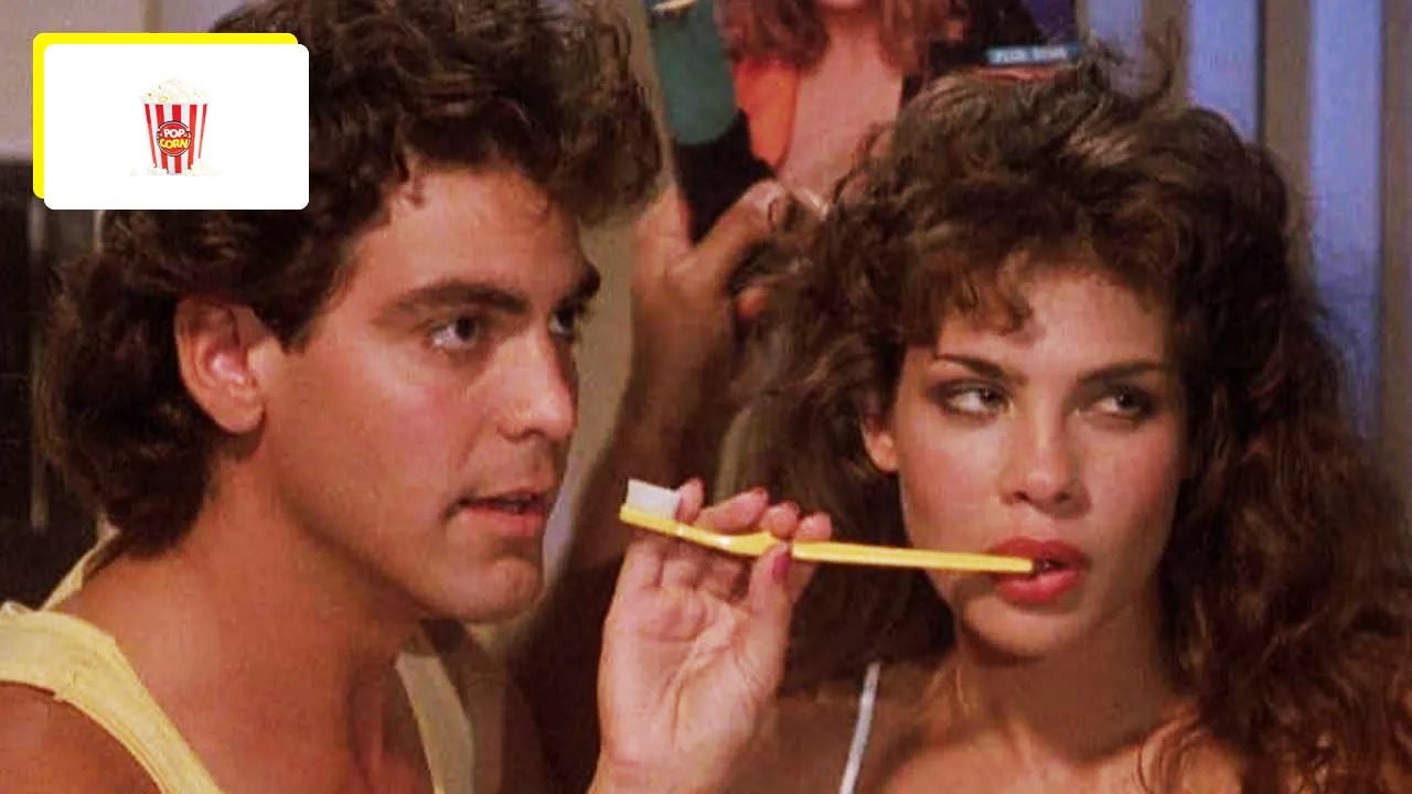George Clooney as a slightly dim-witted pizza chef who is threatened by a killer tomato?  It is possible!